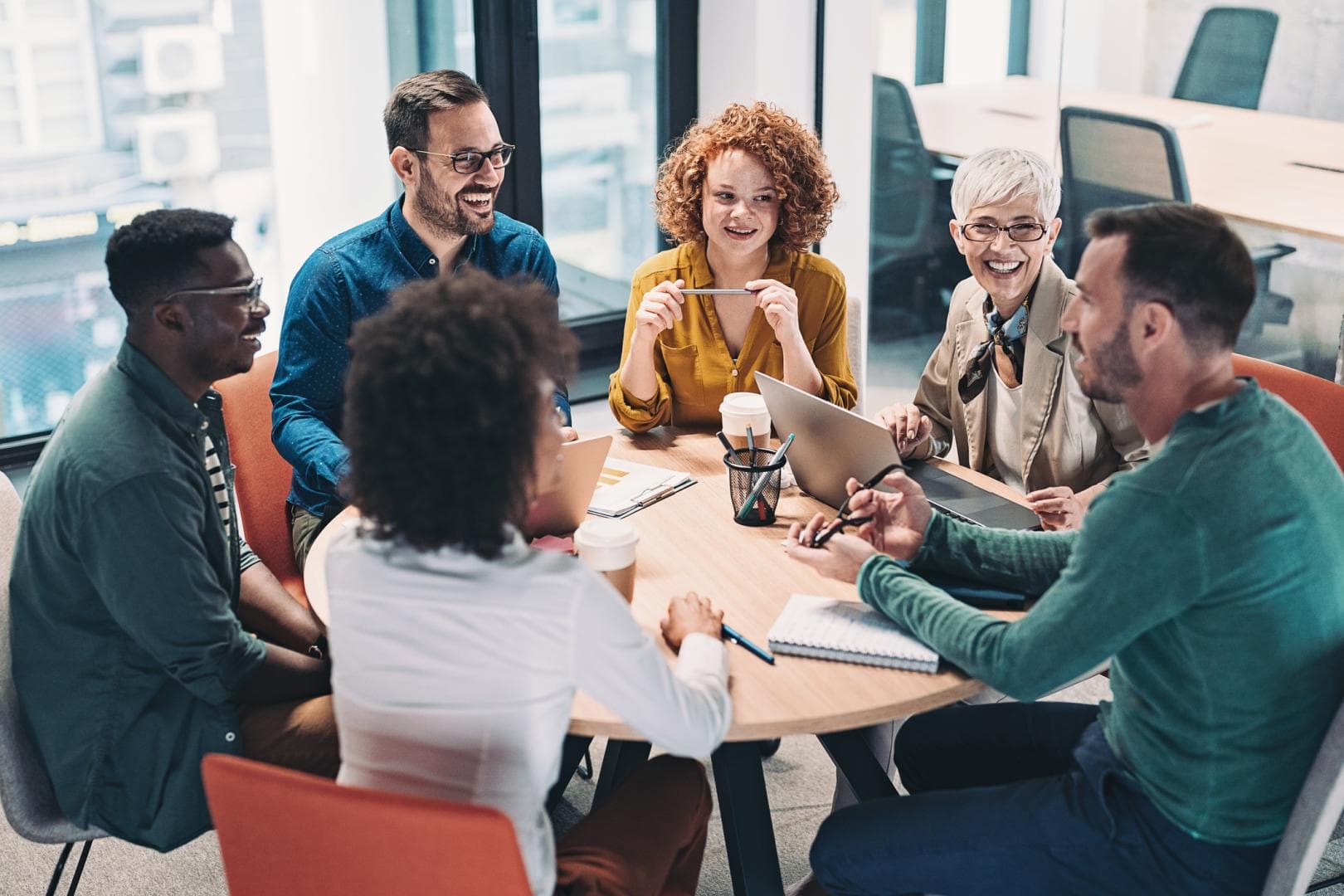 People sitting around a table in an office