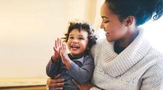 Mother and smiling child