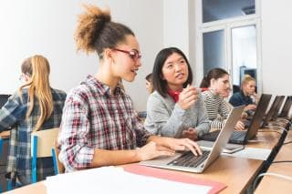 Students talking while studying