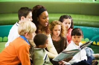 Teacher reading to children