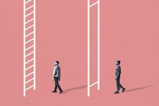 two people walking towards ladders