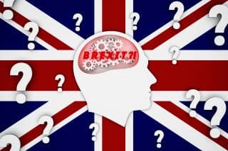 Brexit graphic showing a face on the Union Jack with question marks