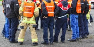 Emergency responders gathered in a circle