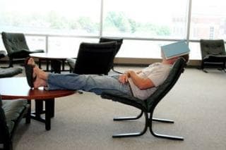 Lazy student sleeping at a desk