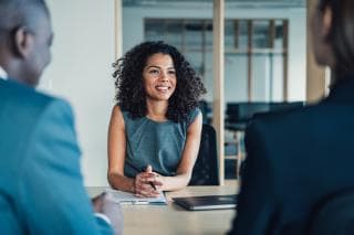 Men and women in business meeting