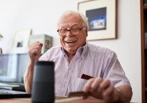 Man using smart speaker edited