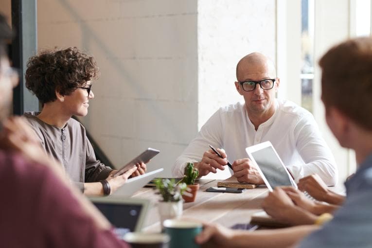 people working at table