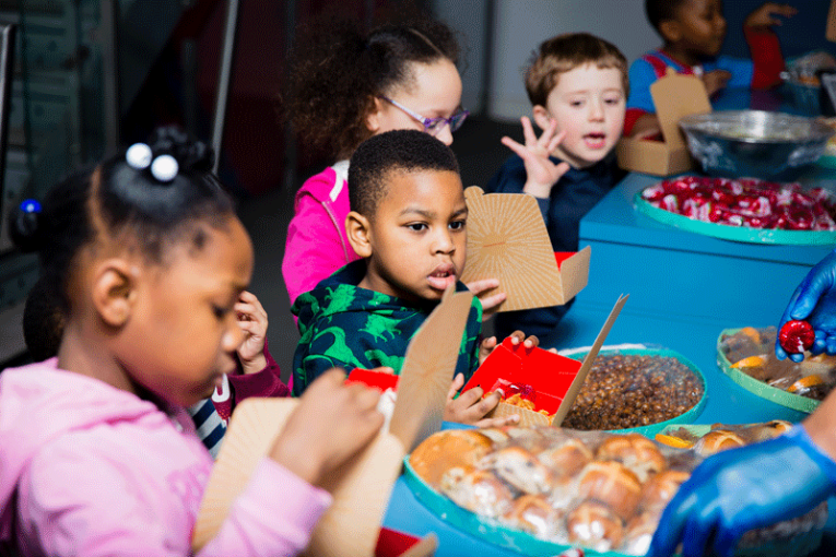 Group of children eating