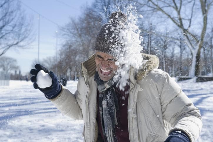 Man getting hit by snowball