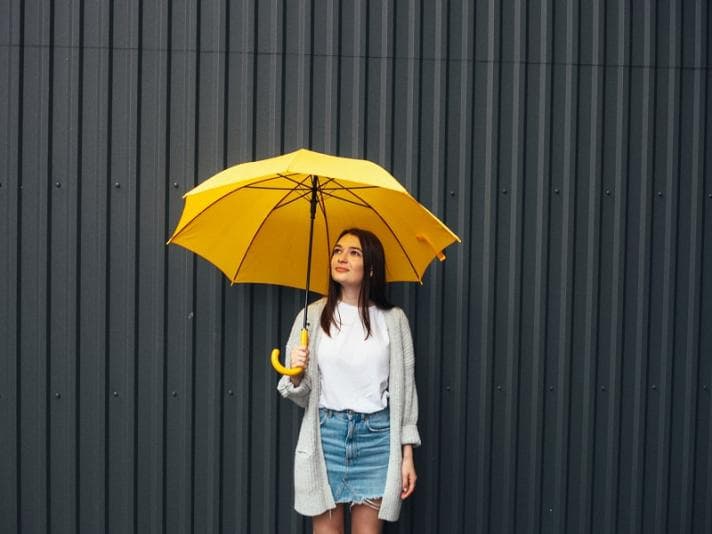 Woman holding umbrella