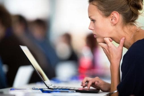 Woman watching a webinar