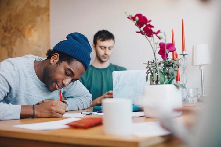 two male students in their flat