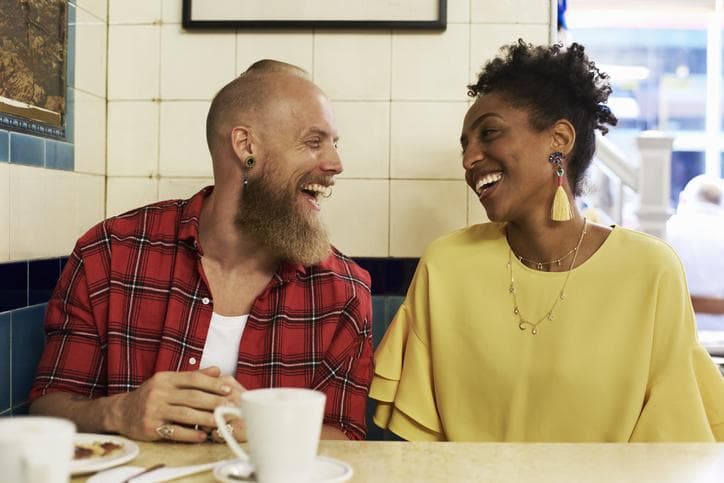 Couple talking and laughing