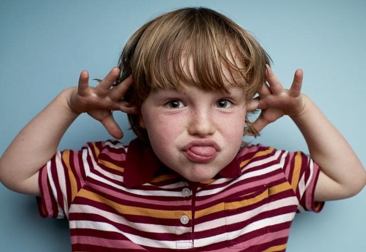 Young boy making a silly face