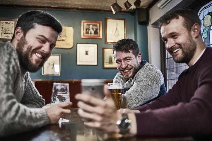 Young men drinking beer