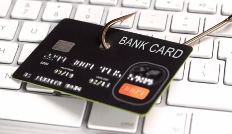 Fishing hook through a bank card