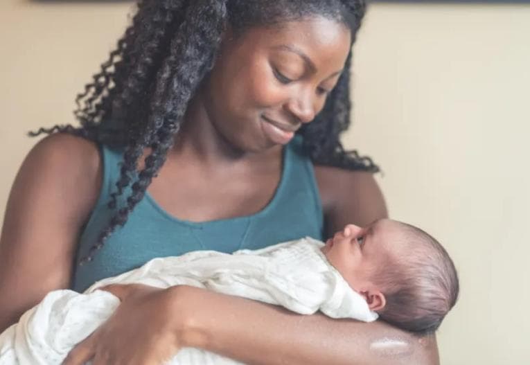 Mother holding baby