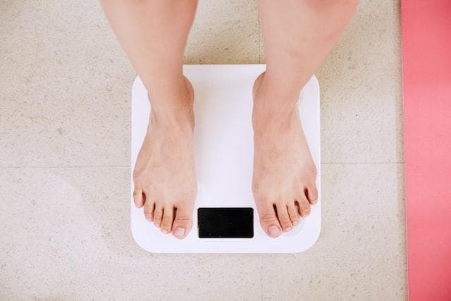 Feet on bathroom scales