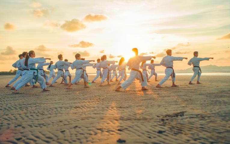 Children participating in karate lesson