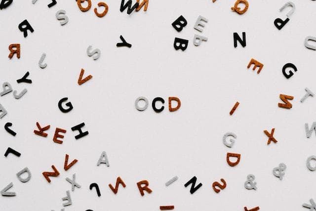 Scattered letters with OCD in the middle