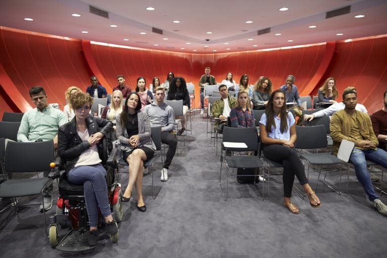 People sitting a lecture hall