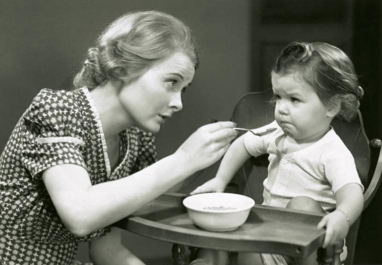 Mother feeding baby