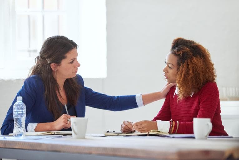 Two kind women in discussion