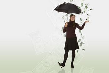 Raining money with happy woman holding umbrella