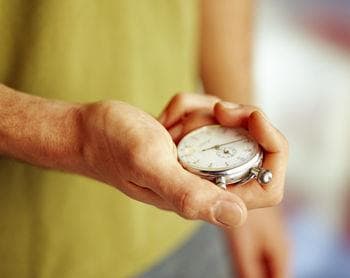 Hand holding a timer