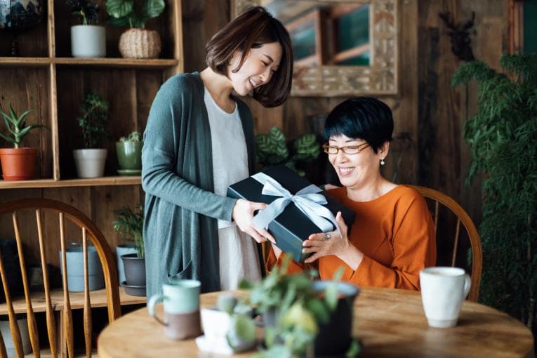 Woman giving a gift