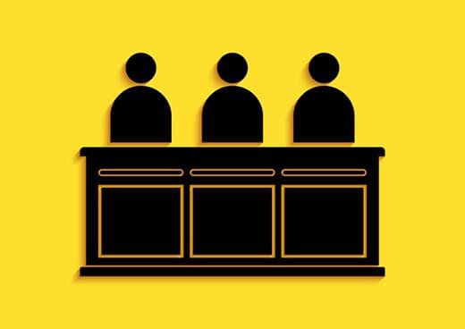 Silhouettes of three jury members 