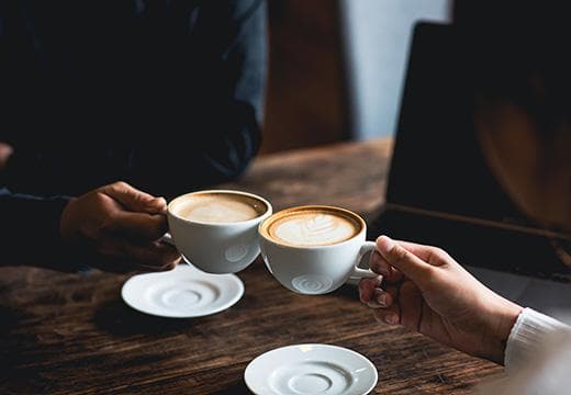 Two people having coffee