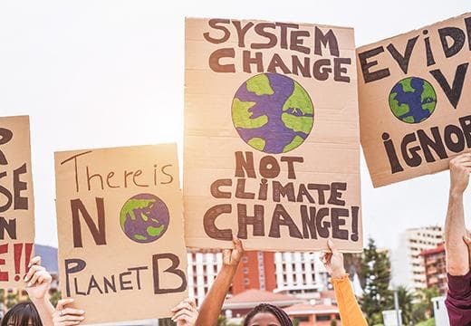 Climate protesters with placards