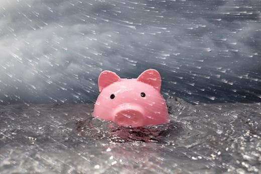 Piggy bank in rain