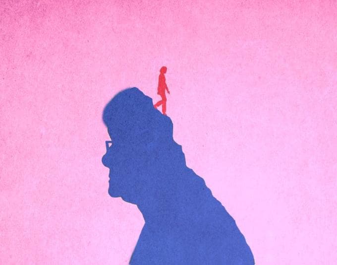 Silhouette of an older person, the back of which forms a path for a younger person to walk down